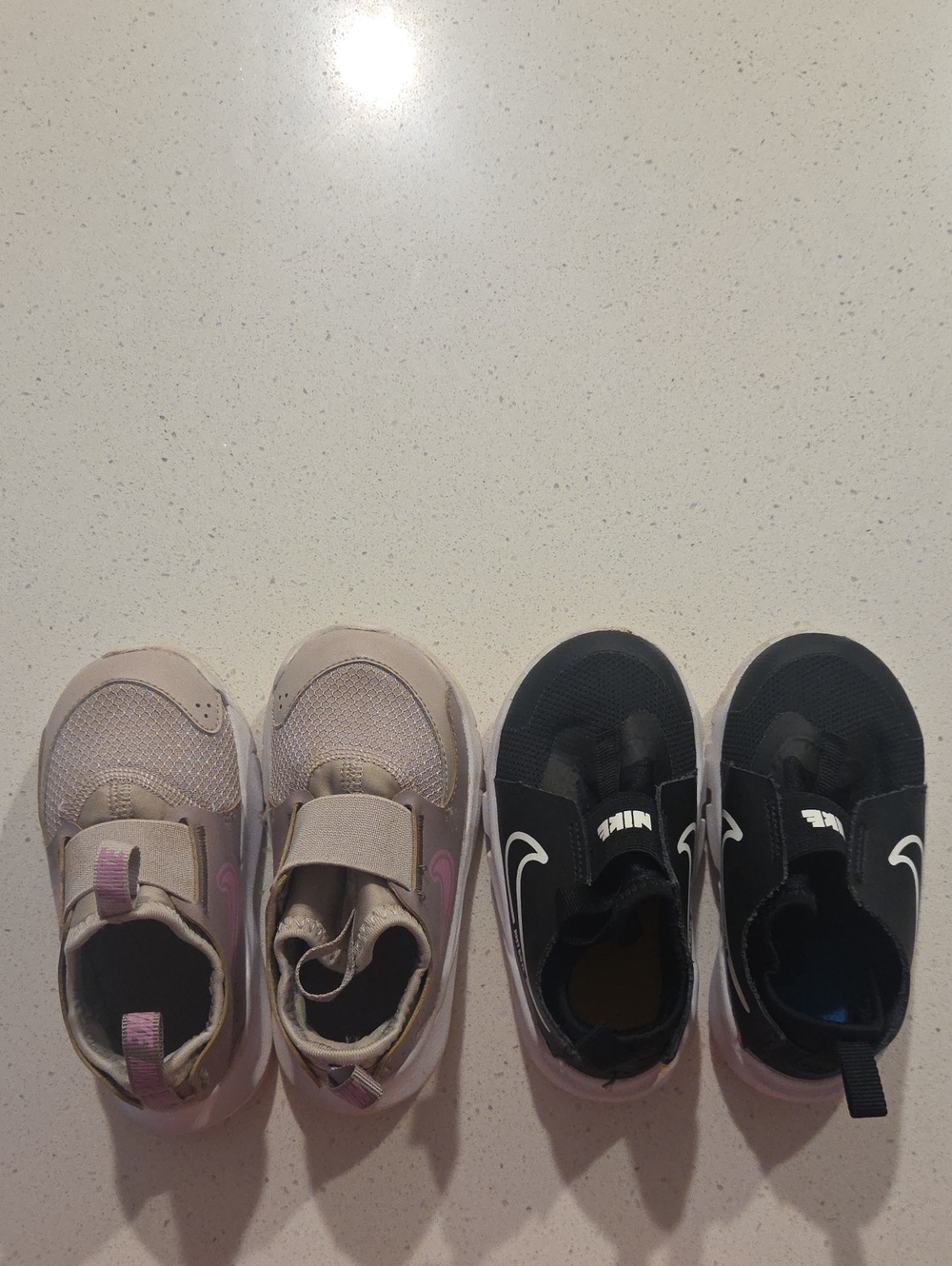 Nike Kids Slip-On Sneakers in Light Pink and Black